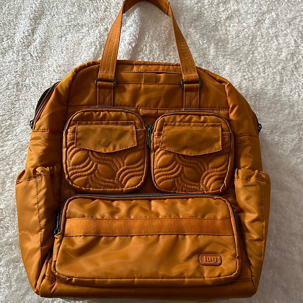Like new Lug Jumper backpack with tote handles, gold, mustard